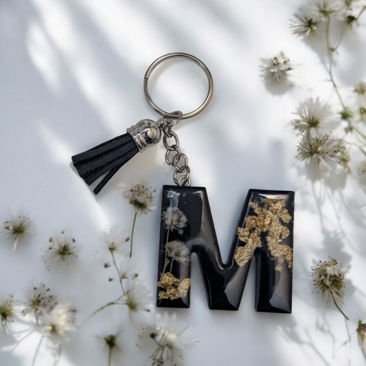 Porte-clés lettre noir et feuille d'or
