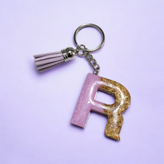 Porte-clés lettre violet et feuille d'or
