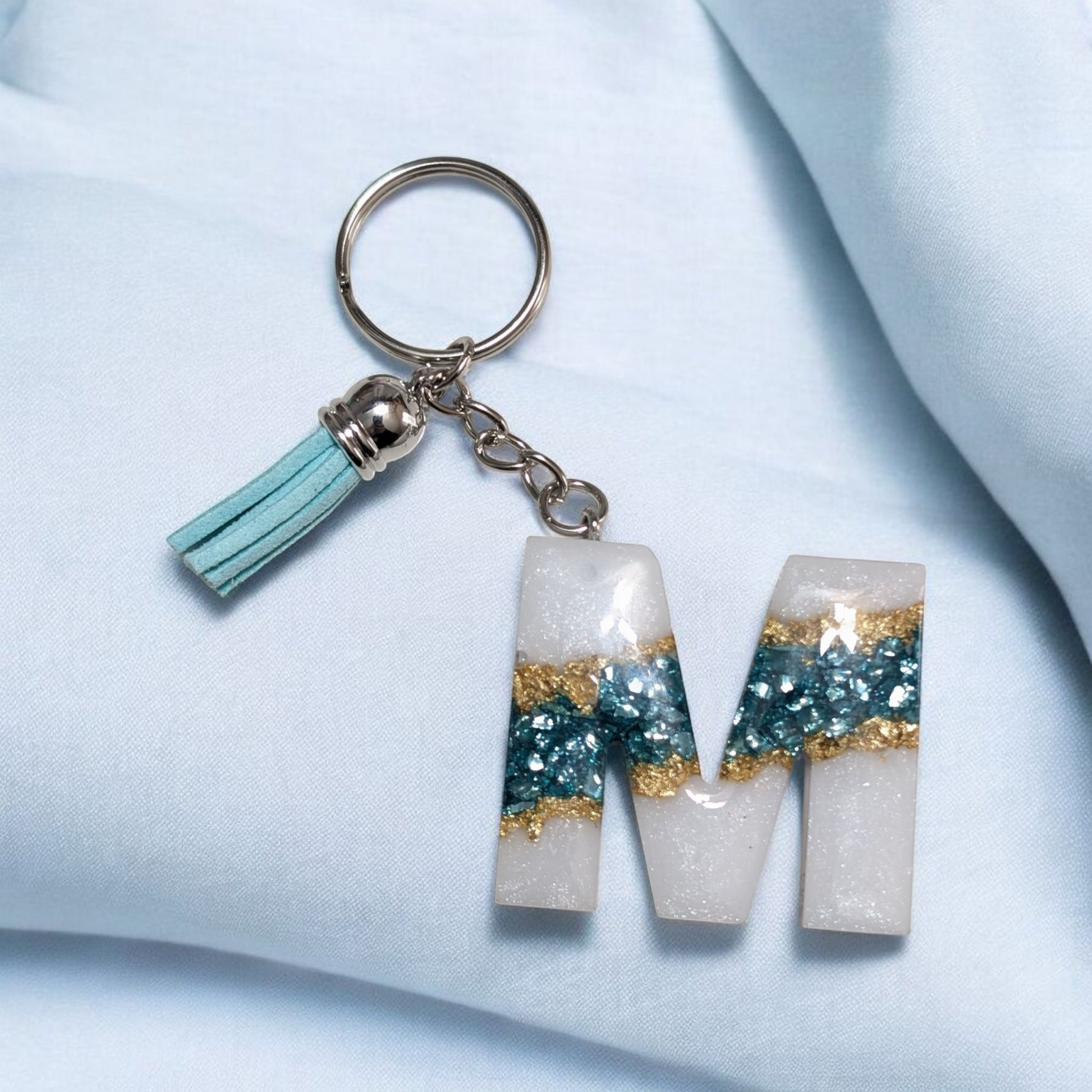 Porte-clés lettre pierres bleu et feuille d'or